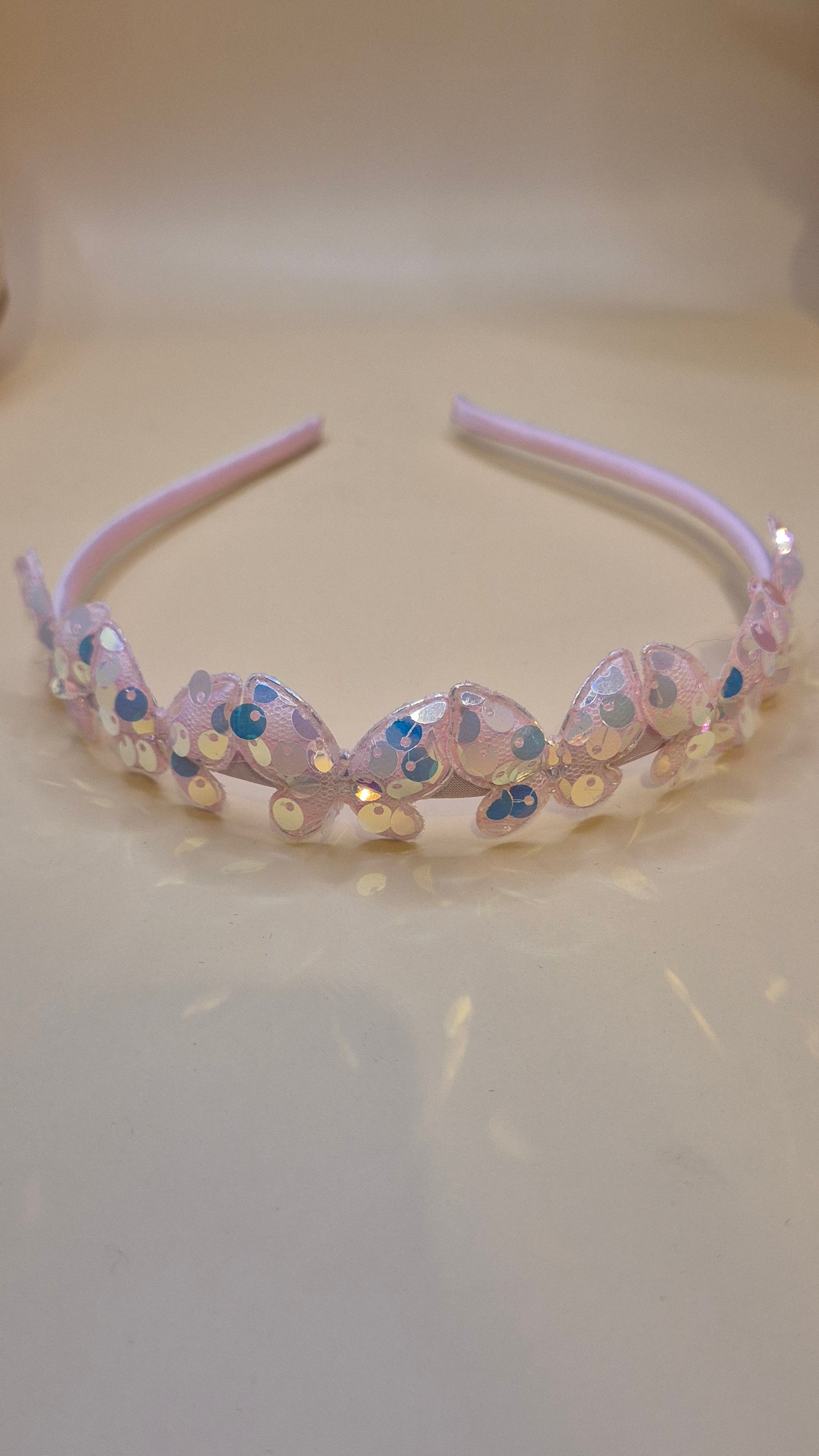Haarreif mit glitzernden Schmetterling-Pailletten