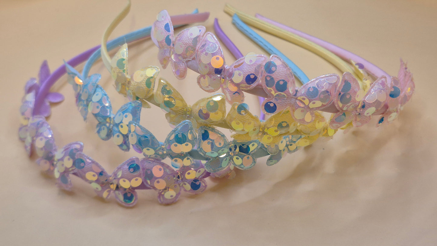Haarreif mit glitzernden Schmetterling-Pailletten