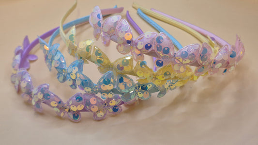 Haarreif mit glitzernden Schmetterling-Pailletten