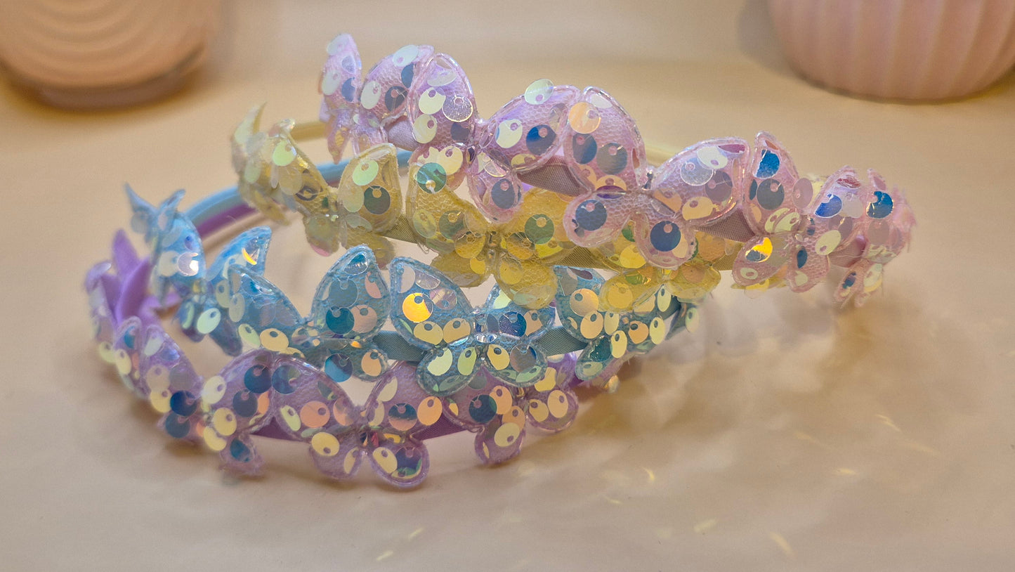 Haarreif mit glitzernden Schmetterling-Pailletten