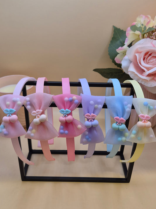 Haarreif mit Schleife mit bunten Kügelchen